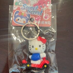 Cute Hello Kitty Keychain with scooter new